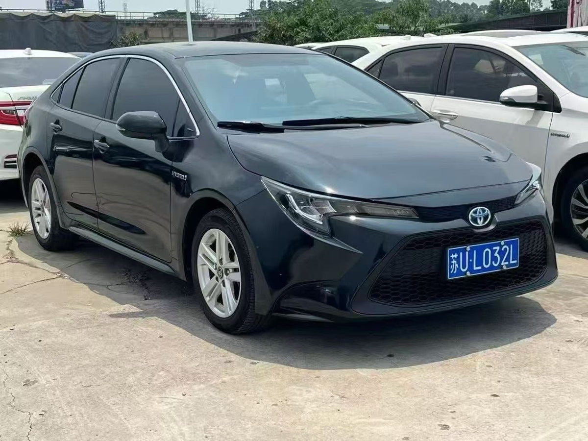 Toyota Corolla Hybrid 2023 — 200,000 km