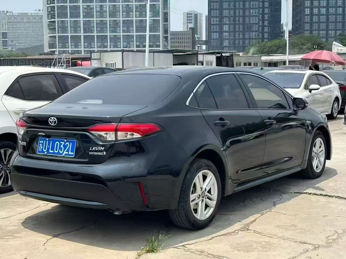 Toyota Corolla Hybrid 2023 — 200,000 km