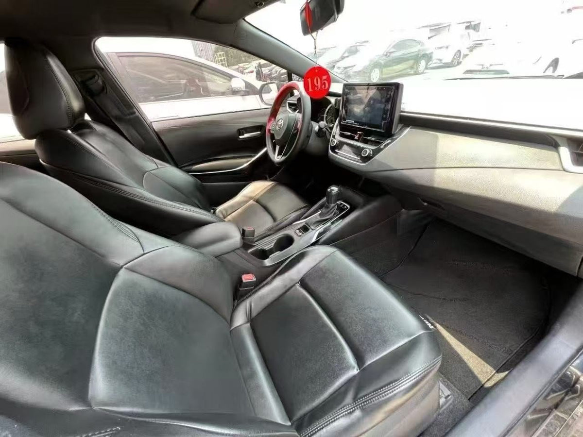 Toyota Corolla Hybrid 2023 — 200,000 km