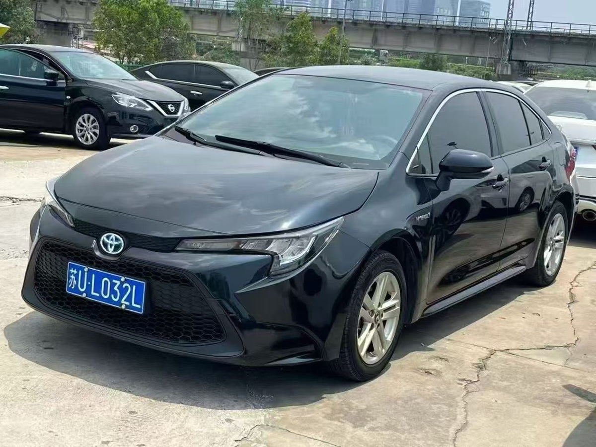 Toyota Corolla Hybrid 2023 — 200,000 km